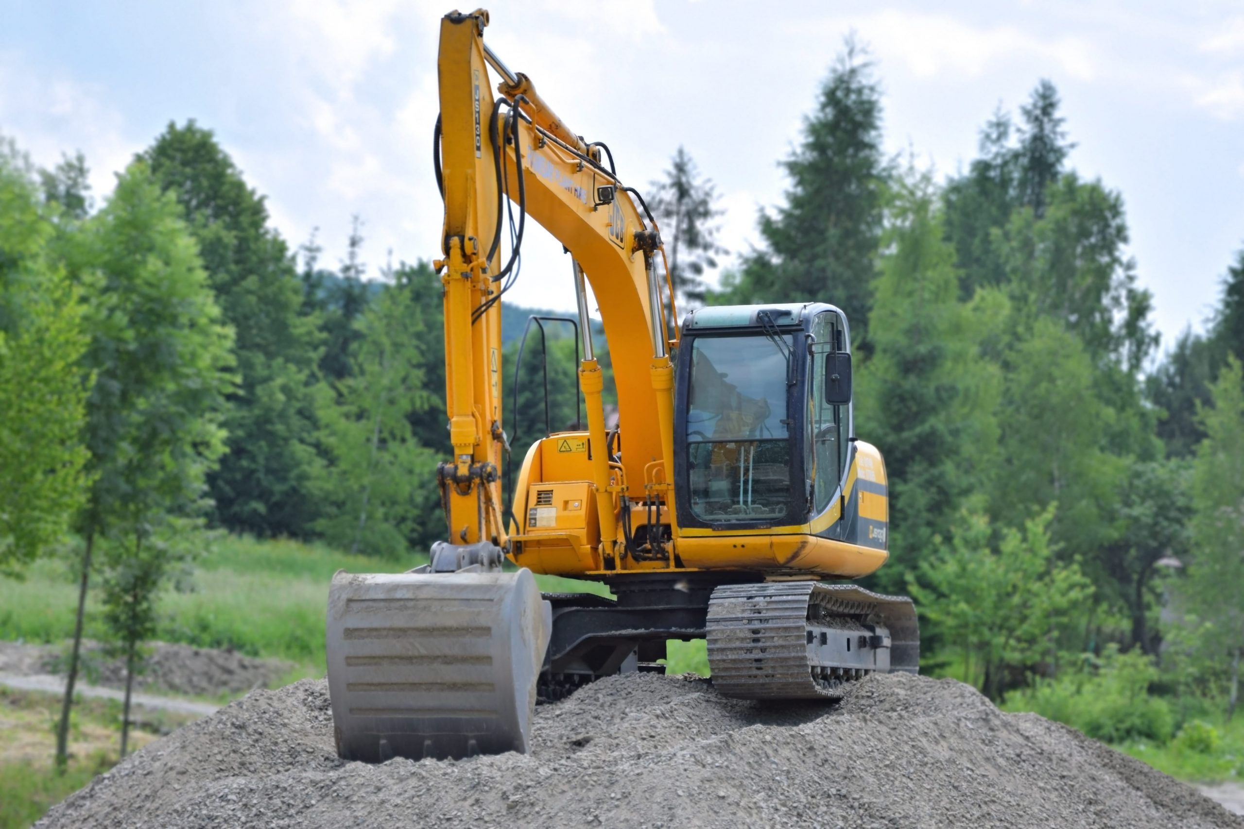Excavator on hill
